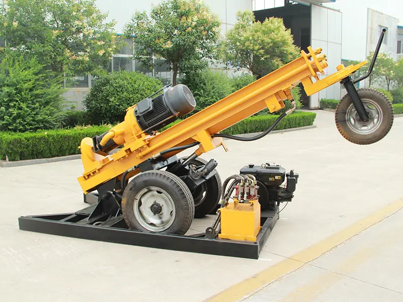 Portable water well drill